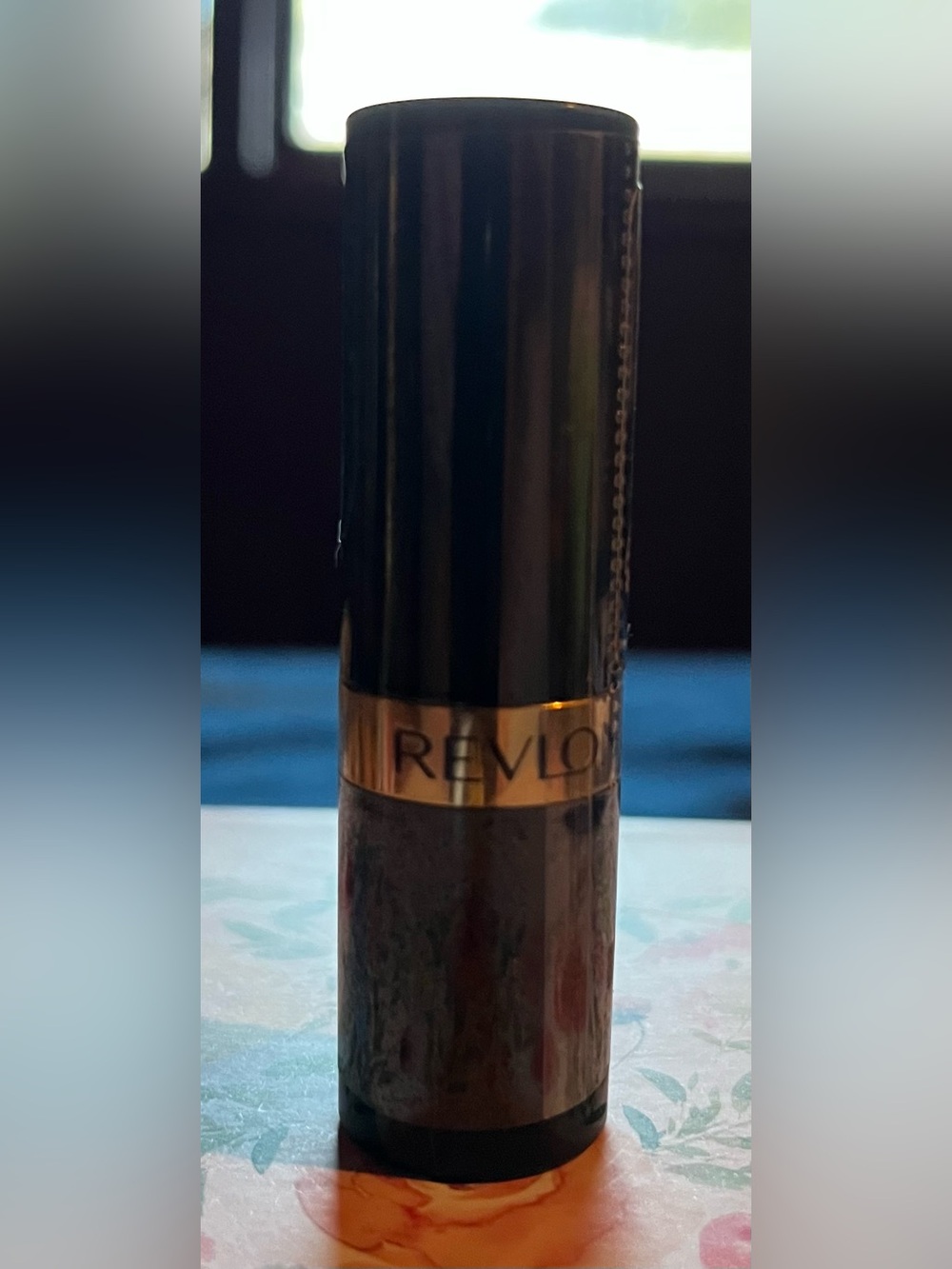 Revlon Lip Care Stick in Black and Gold Accent